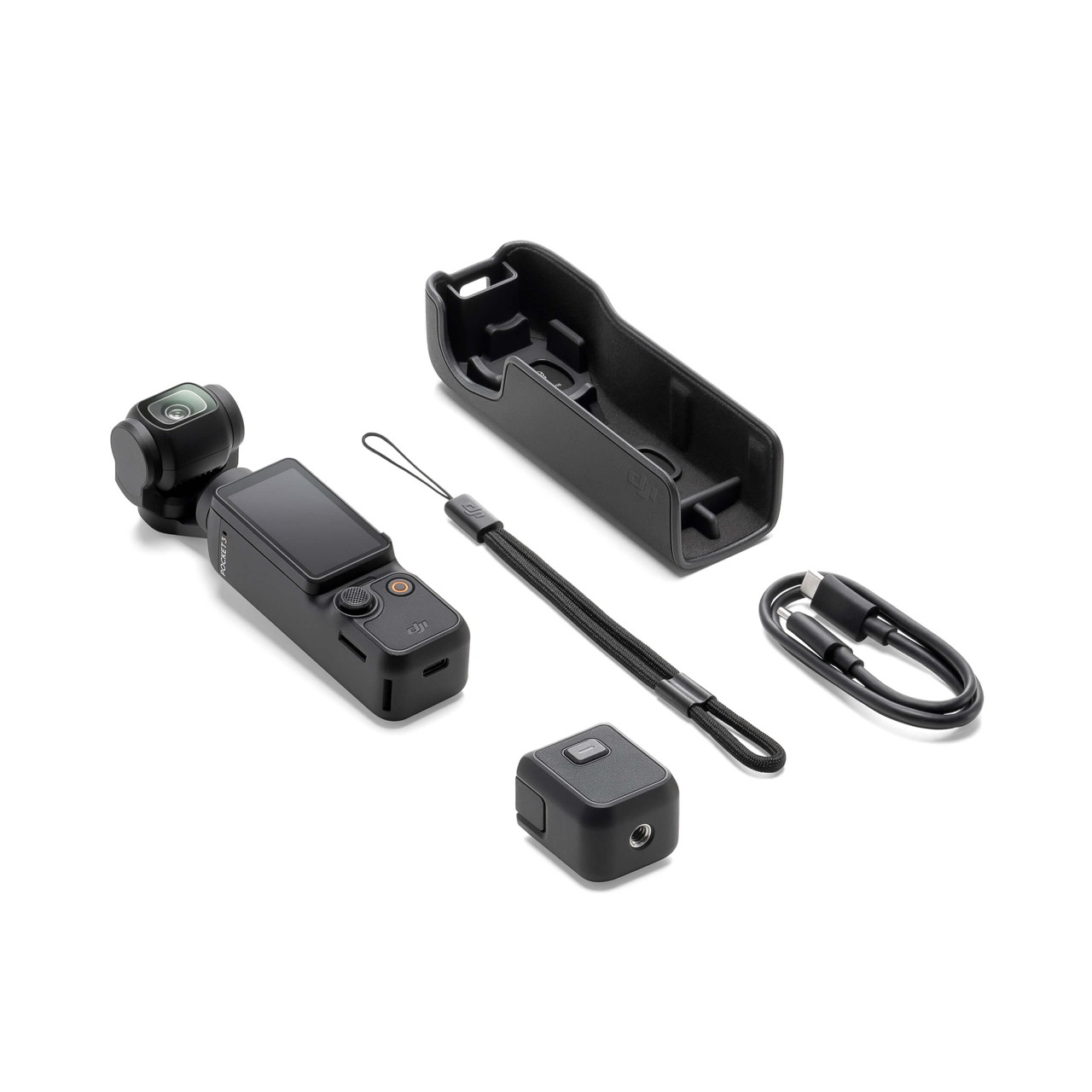 The full kit laid out: camera, protective case, wrist strap, mount adapter and USB-C cable